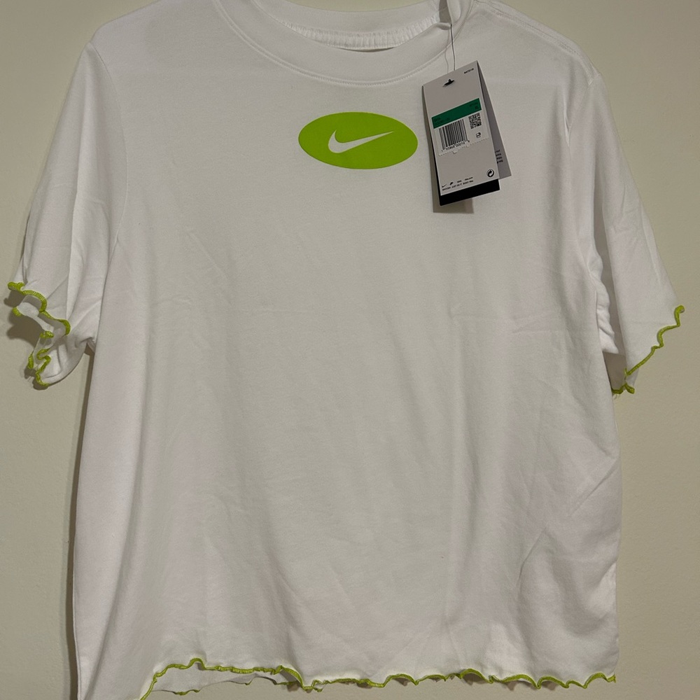 White Nike tea with lime green ruffles on edges, girls size extra large